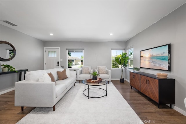 4513 E Cervato St, Long Beach, CA 90815 - living area with dark wood-style floors, plenty of natural light, and recessed lighting