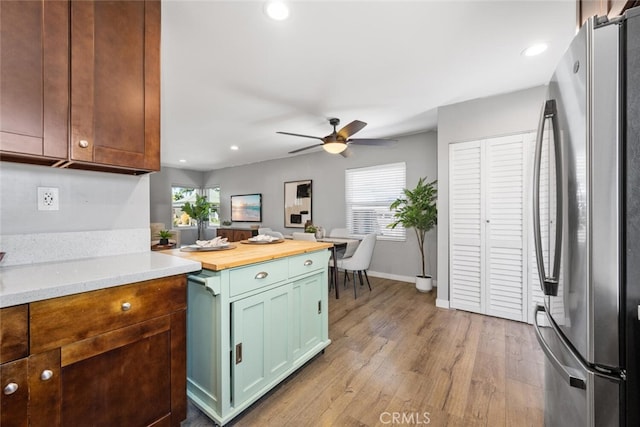 4513 E Cervato St, Long Beach, CA 90815 - kitchen featuring freestanding refrigerator, plenty of natural light, light wood-style floors, ceiling fan, and recessed lighting