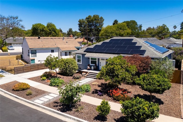 4513 E Cervato St, Long Beach, CA 90815 - ranch-style home with solar panels, a residential view, and roof with shingles