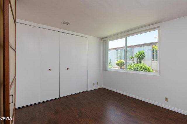 777 E Valley Blvd Unit 142, Alhambra, CA 91801 - unfurnished bedroom featuring dark wood-type flooring and a closet