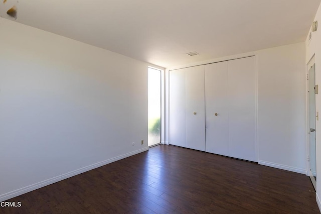 777 E Valley Blvd Unit 142, Alhambra, CA 91801 - unfurnished bedroom with dark wood-type flooring and a closet