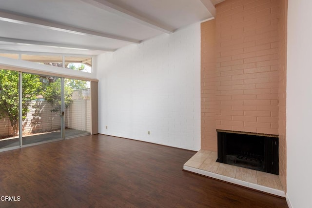 777 E Valley Blvd Unit 142, Alhambra, CA 91801 - unfurnished living room with beamed ceiling, wood finished floors, and a tiled fireplace