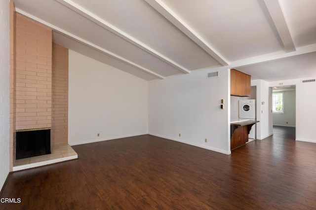 777 E Valley Blvd Unit 142, Alhambra, CA 91801 - unfurnished living room with washer / clothes dryer, beamed ceiling, dark wood-style floors, and a fireplace