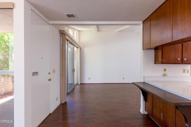 777 E Valley Blvd Unit 142, Alhambra, CA 91801 - kitchen featuring healthy amount of natural light, dark wood finished floors, and brown cabinetry