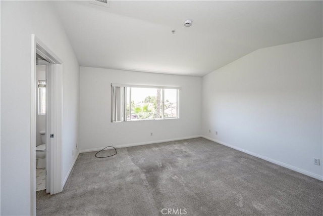 13056 Hagar St, Sylmar, CA 91342 - spare room featuring carpet floors and vaulted ceiling