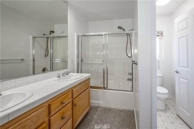 13056 Hagar St, Sylmar, CA 91342 - bathroom with double vanity, enclosed tub / shower combo, and tile patterned floors