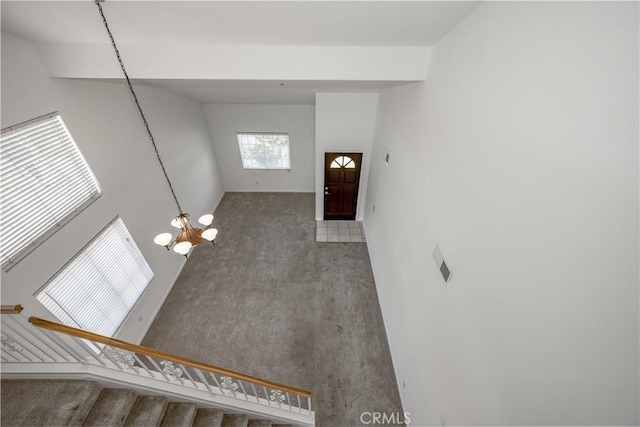 13056 Hagar St, Sylmar, CA 91342 - entryway with carpet flooring, a chandelier, and stairs