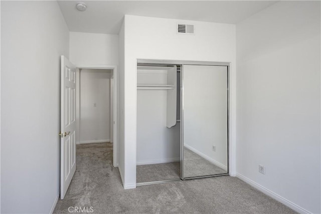 13056 Hagar St, Sylmar, CA 91342 - unfurnished bedroom featuring carpet floors and a closet