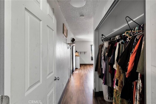 13144 Algonquin Rd, Apple Valley, CA 92308 - spacious closet featuring wood finished floors