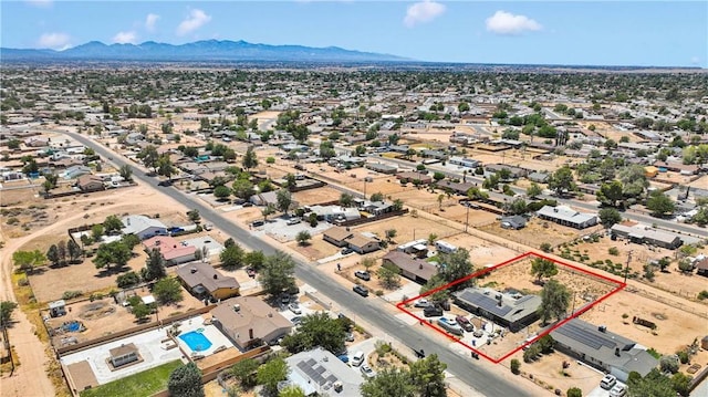 13144 Algonquin Rd, Apple Valley, CA 92308 - aerial overview of property's location featuring a mountain backdrop and property boundaries highlighted