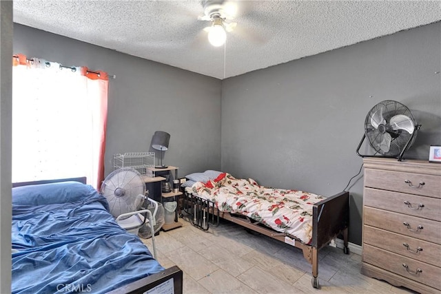 13144 Algonquin Rd, Apple Valley, CA 92308 - bedroom featuring a textured ceiling and ceiling fan