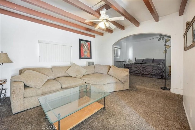 60810 Sunrise Rd, Whitewater, CA 92282 - living area with ceiling fan, arched walkways, beamed ceiling, and carpet floors