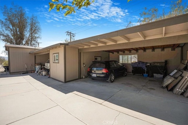 60810 Sunrise Rd, Whitewater, CA 92282 - view of vehicle parking with an attached carport