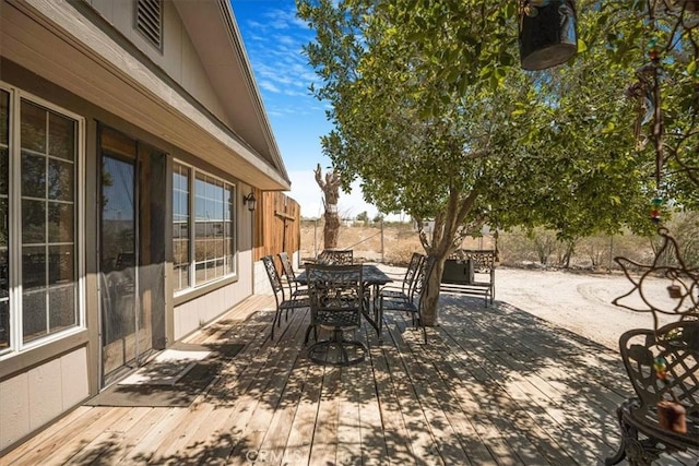 60810 Sunrise Rd, Whitewater, CA 92282 - view of patio featuring outdoor dining area and a deck