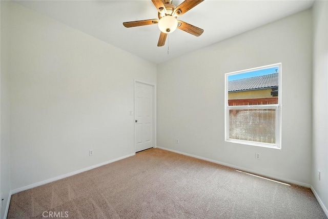 12038 Diego Ct, Moreno Valley, CA 92557 - carpeted empty room with baseboards and a ceiling fan