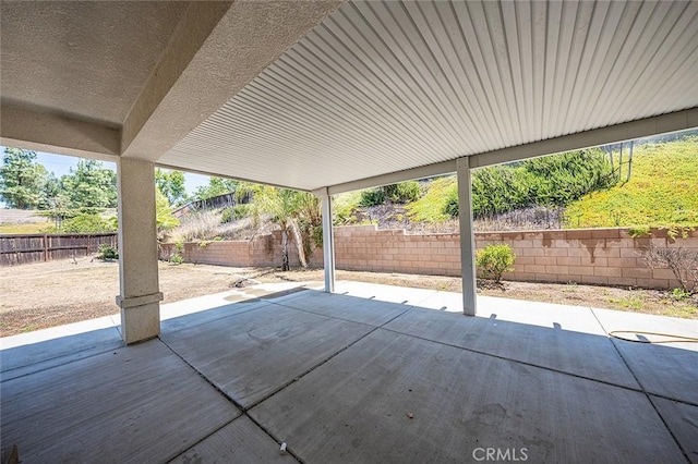 12038 Diego Ct, Moreno Valley, CA 92557 - fenced backyard with a patio