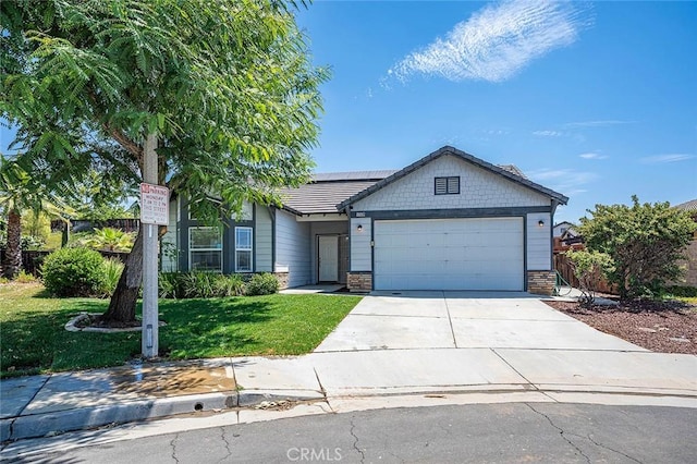 12038 Diego Ct, Moreno Valley, CA 92557 - ranch-style home with a front lawn, concrete driveway, solar panels, and an attached garage