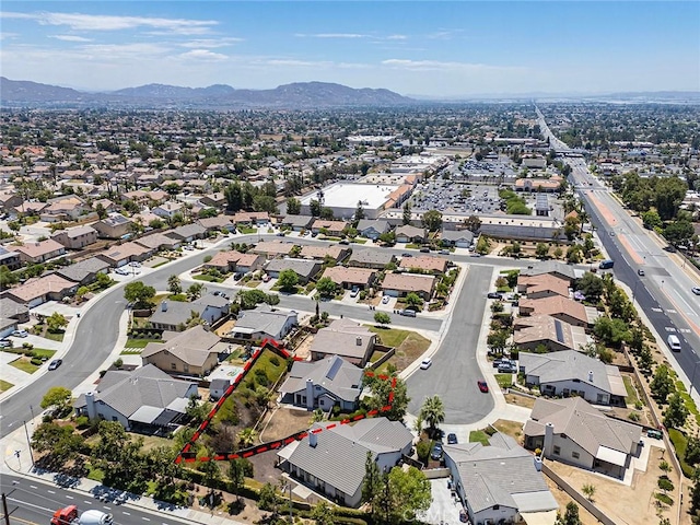 12038 Diego Ct, Moreno Valley, CA 92557 - aerial perspective of suburban area featuring mountains and property boundaries highlighted