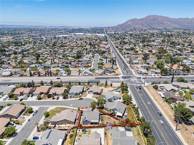 12038 Diego Ct, Moreno Valley, CA 92557 - aerial view of residential area featuring mountains and property parcel outlined