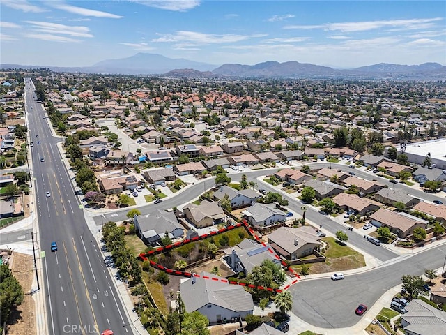 12038 Diego Ct, Moreno Valley, CA 92557 - aerial view of residential area with mountains and property parcel outlined