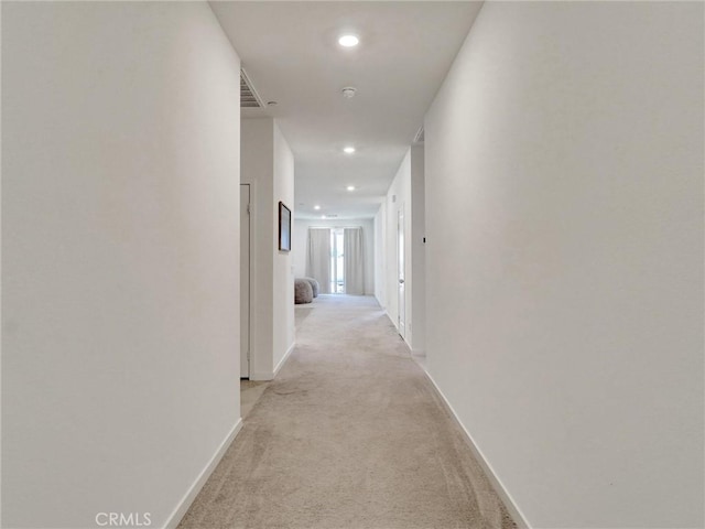 11576 S Crescent St, Desert Hot Springs, CA 92240 - hallway featuring light colored carpet and recessed lighting