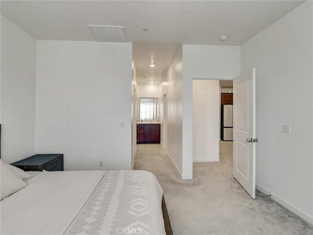 11576 S Crescent St, Desert Hot Springs, CA 92240 - bedroom with freestanding refrigerator, light carpet, and attic access