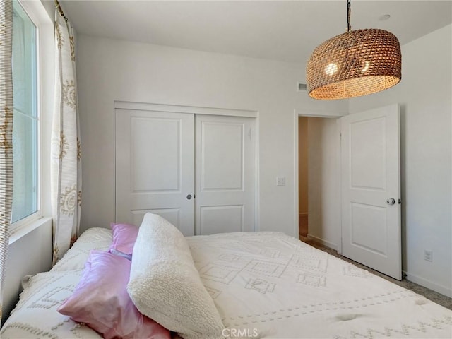11576 S Crescent St, Desert Hot Springs, CA 92240 - carpeted bedroom with a closet and baseboards