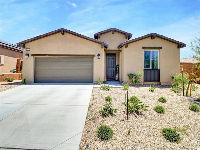 11576 S Crescent St, Desert Hot Springs, CA 92240 - view of front of property featuring a garage, stucco siding, and driveway