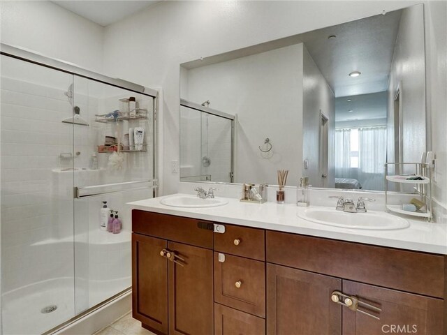 11576 S Crescent St, Desert Hot Springs, CA 92240 - bathroom with connected bathroom, a stall shower, and double vanity