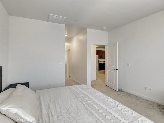 11576 S Crescent St, Desert Hot Springs, CA 92240 - bedroom featuring freestanding refrigerator and light colored carpet