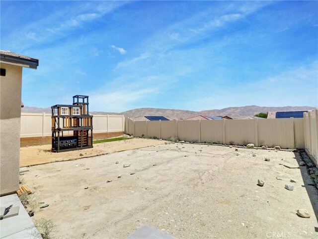 11576 S Crescent St, Desert Hot Springs, CA 92240 - fenced backyard with a mountain view