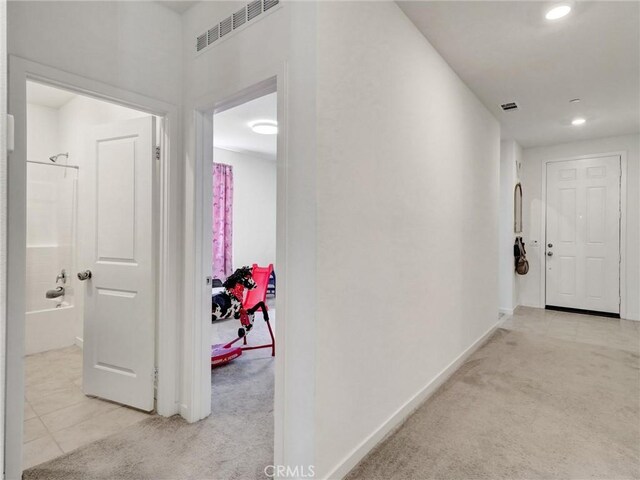 11576 S Crescent St, Desert Hot Springs, CA 92240 - hallway with recessed lighting and light colored carpet