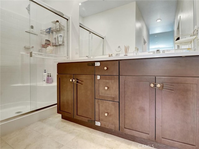 11576 S Crescent St, Desert Hot Springs, CA 92240 - bathroom with a stall shower, double vanity, and tile patterned flooring