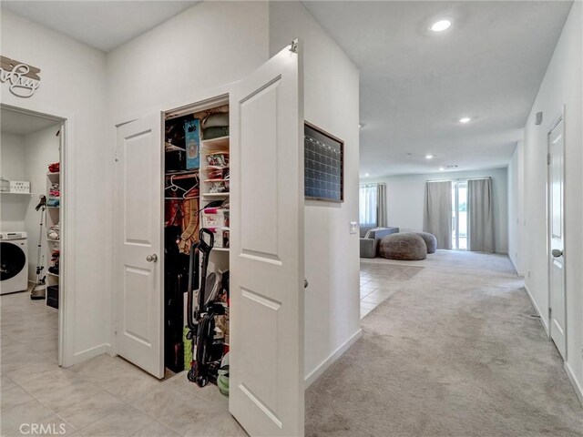 11576 S Crescent St, Desert Hot Springs, CA 92240 - corridor featuring washer / clothes dryer, recessed lighting, and light tile patterned flooring