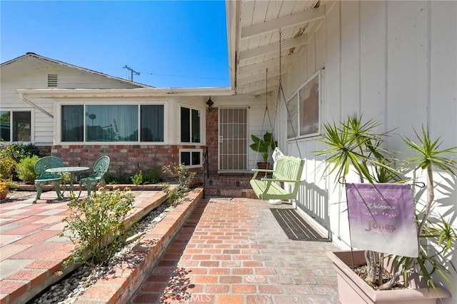 9802 Swallow Ln, Garden Grove, CA 92841 - view of exterior entry with a patio