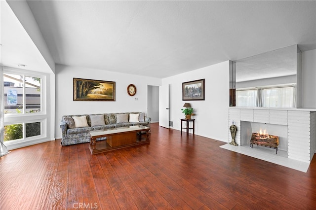 9802 Swallow Ln, Garden Grove, CA 92841 - living room with wood-type flooring and a fireplace