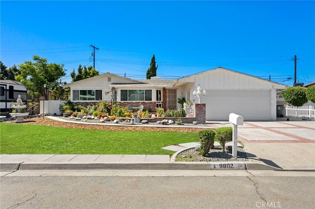 9802 Swallow Ln, Garden Grove, CA 92841 - ranch-style house featuring driveway, a garage, and brick siding