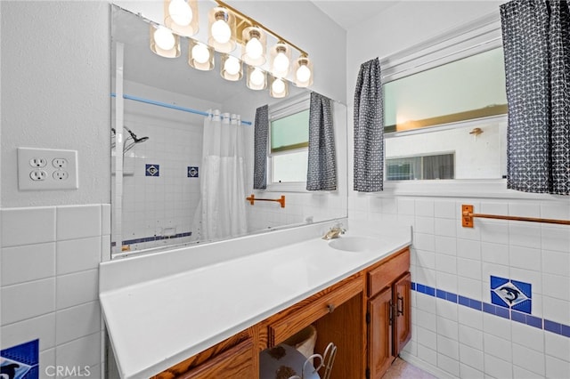 9802 Swallow Ln, Garden Grove, CA 92841 - full bath with tile walls, vanity, a shower with curtain, and wainscoting