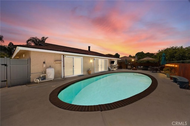 1935 Adobe Ave, Corona, CA 92882 - pool at dusk with a patio