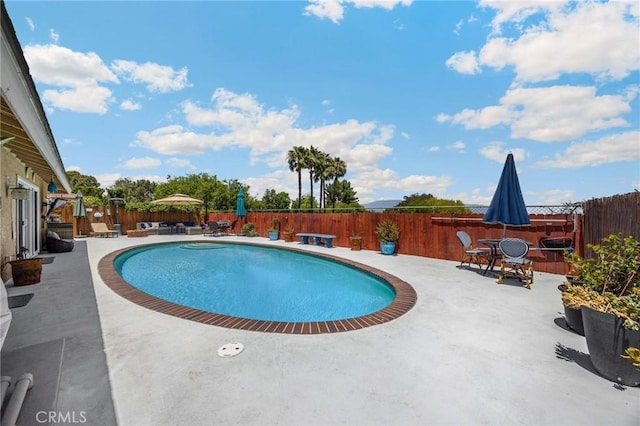 1935 Adobe Ave, Corona, CA 92882 - view of swimming pool with a patio, a fenced backyard, and outdoor dining space