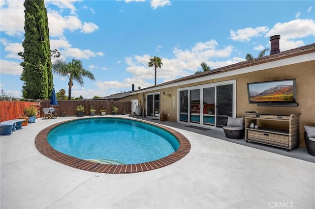 1935 Adobe Ave, Corona, CA 92882 - view of swimming pool with a patio area and a fenced backyard