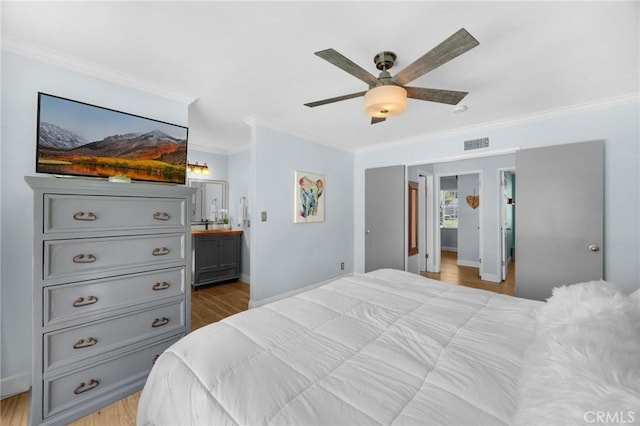 1935 Adobe Ave, Corona, CA 92882 - bedroom featuring crown molding, light wood-type flooring, connected bathroom, and a ceiling fan