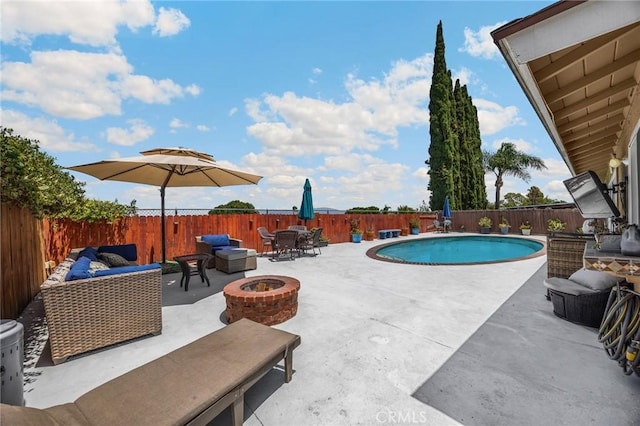 1935 Adobe Ave, Corona, CA 92882 - view of swimming pool with a patio, an outdoor living space with a fire pit, a fenced backyard, and outdoor dining area