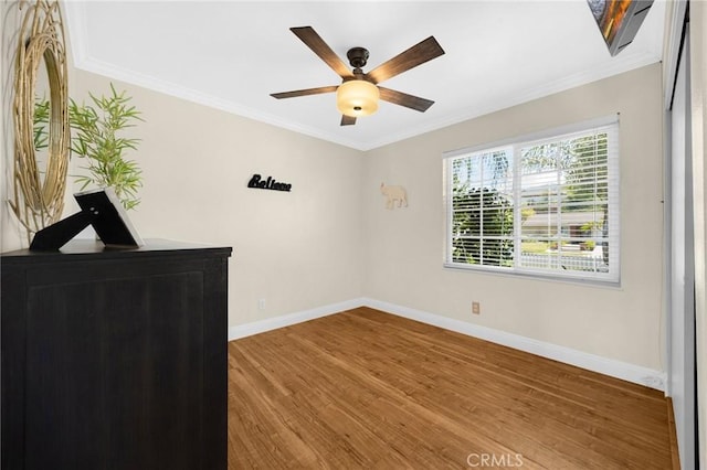 1935 Adobe Ave, Corona, CA 92882 - empty room featuring wood finished floors, crown molding, and a ceiling fan