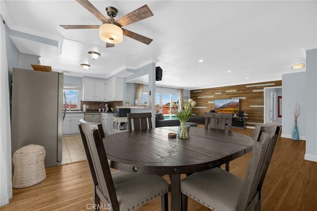 1935 Adobe Ave, Corona, CA 92882 - dining area with wood walls, a ceiling fan, light wood-style flooring, and recessed lighting