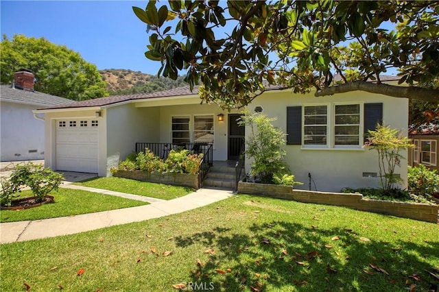 1852 Alpha Rd, Glendale, CA 91208 - ranch-style house featuring a garage, a front lawn, stucco siding, and driveway