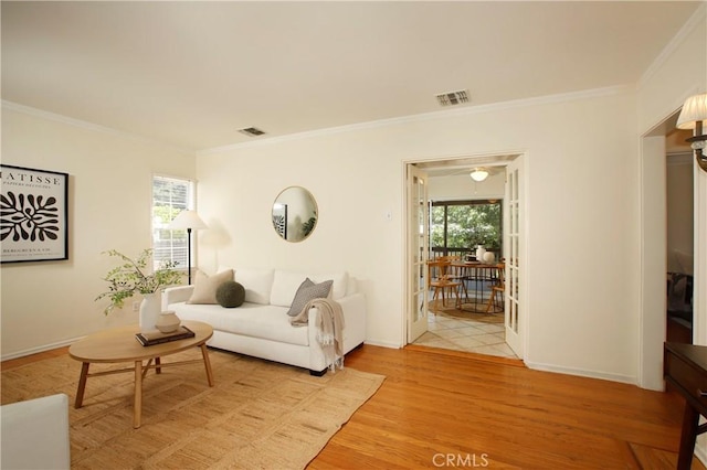 1852 Alpha Rd, Glendale, CA 91208 - living area featuring crown molding and light wood-style flooring