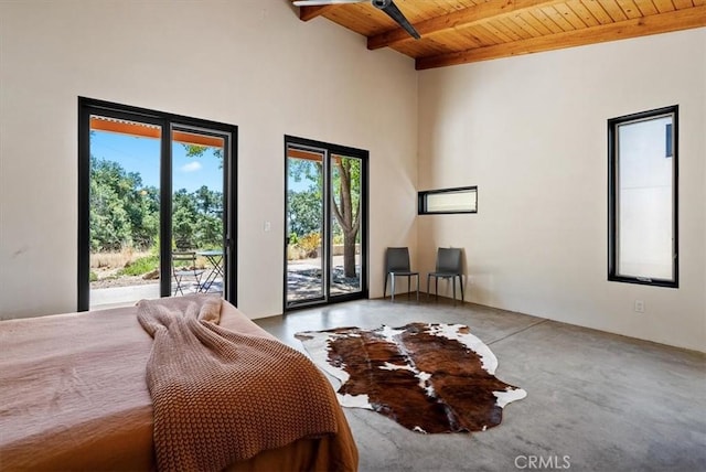 4190 Shadow Canyon Rd, Templeton, CA 93465 - bedroom featuring a wooden ceiling with exposed beams, access to outside, concrete flooring, and a high ceiling