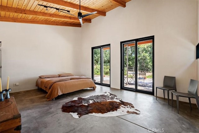 4190 Shadow Canyon Rd, Templeton, CA 93465 - bedroom featuring a wooden ceiling with exposed beams, concrete flooring, and access to exterior