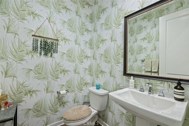 28816 Sedge Ln, Saugus, CA 91350 - half bathroom featuring wallpapered walls